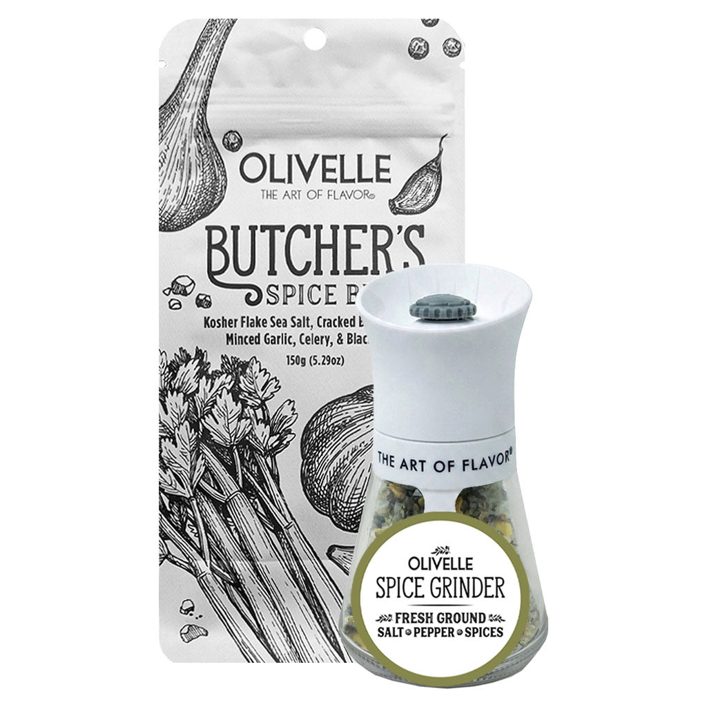 Olivelle Butcher's Spice Flakes in a white resealable pouch next to a white ceramic spice grinder with a white lid, both featuring black line art illustrations and a green circular label.