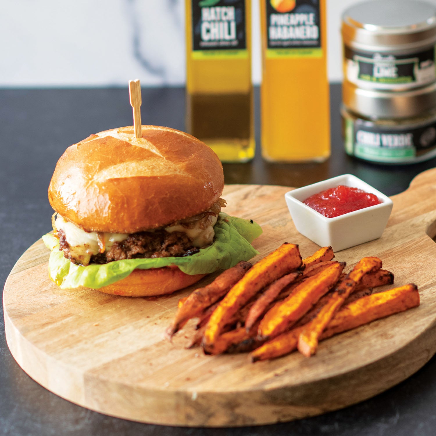 Hatch Chile Burger with Red Pepper Jam and Caramelized Onions with Chili Lime Sweet Potato Fries