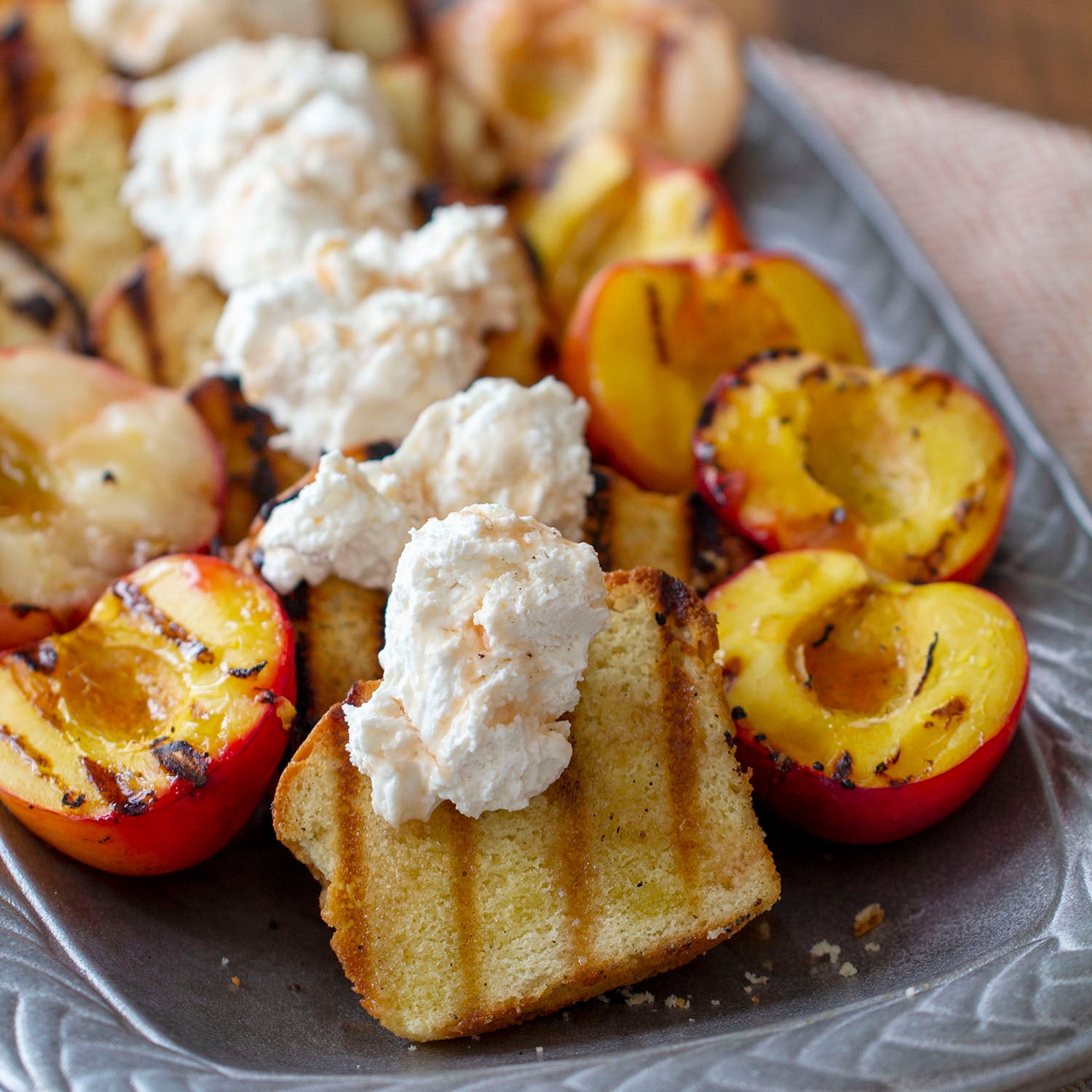 Grilled Pound Cake & Stone Fruit with Salted Strawberry Whipped Cream