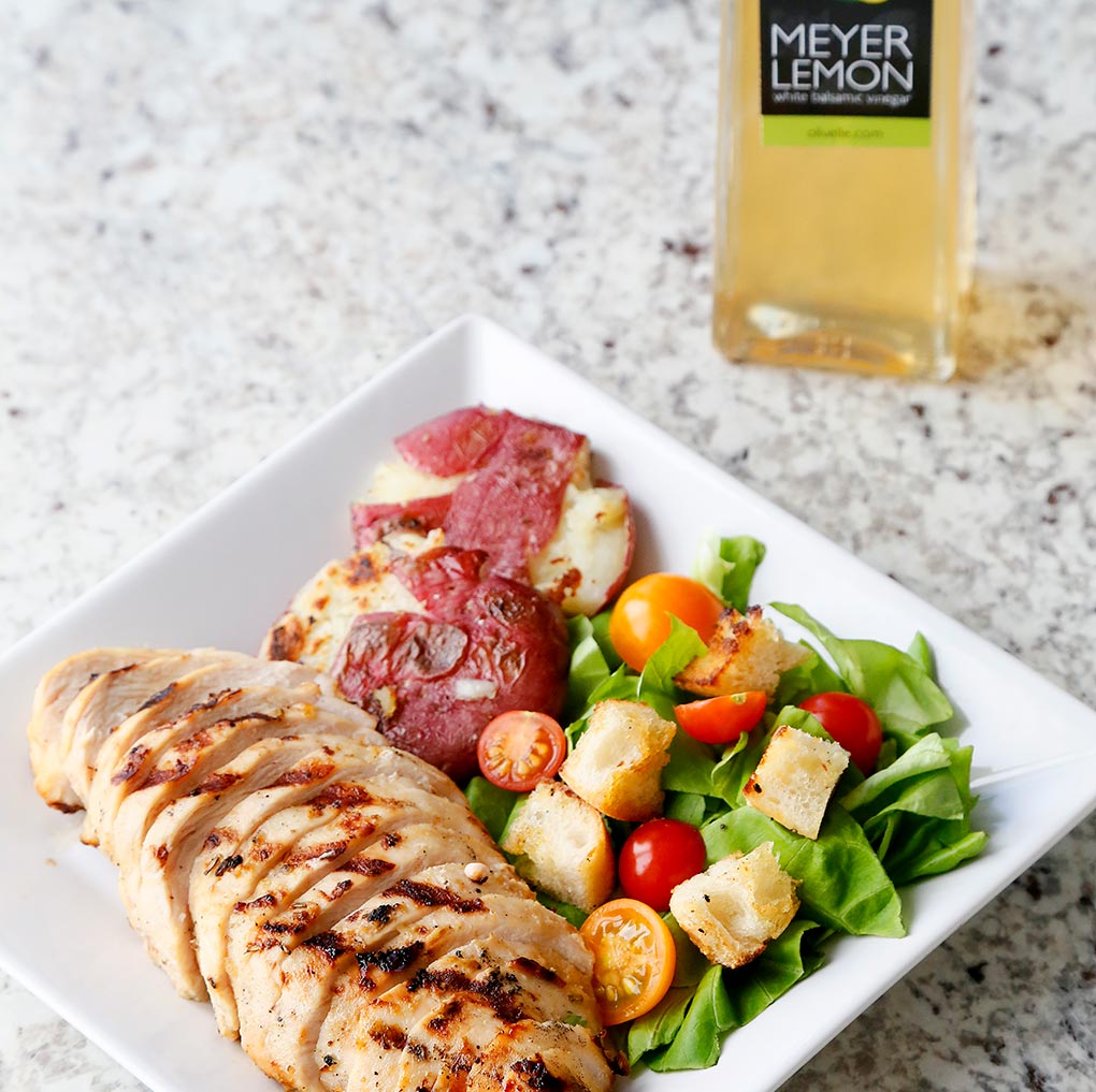 Lemon & Herb Marinated Chicken with Green Salad with Tomatoes and Croutons and a side of Roasted Vegetables using the Meyer Lemon White Balsamic Vinegar.