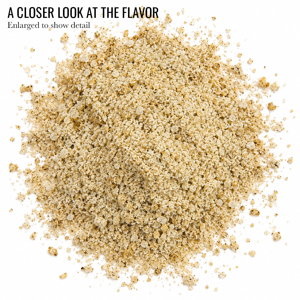 Close up of golden tan Burnt Sugar Kettle Popcorn Seasoning granules with the words A Closer Look at the Flavor