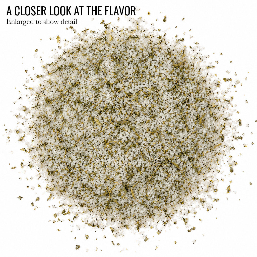 Close up of pale Citrus Dill Infused Sea Salt with green flecks and the words A Closer Look at the Flavor