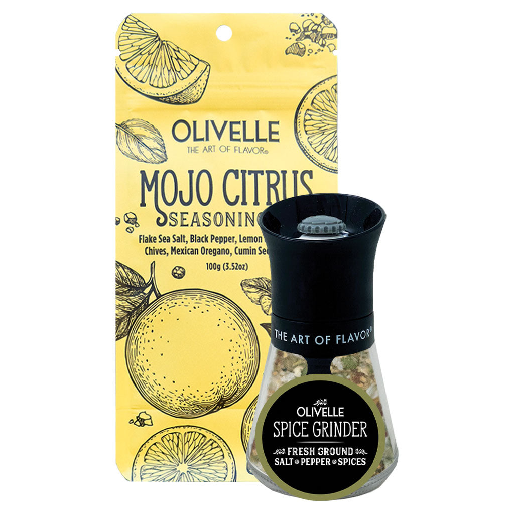 Olivelle Mojo Citrus Seasoning with Olive Spice Grinder, featuring a yellow illustrated pouch and a clear glass spice grinder with a black top and black label.