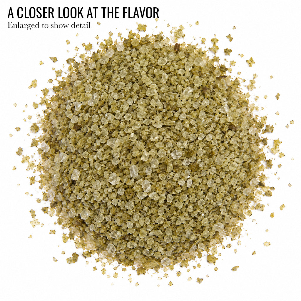 Close up of green flecked Rosemary Infused Sea Salt with the words A Closer Look at the Flavor