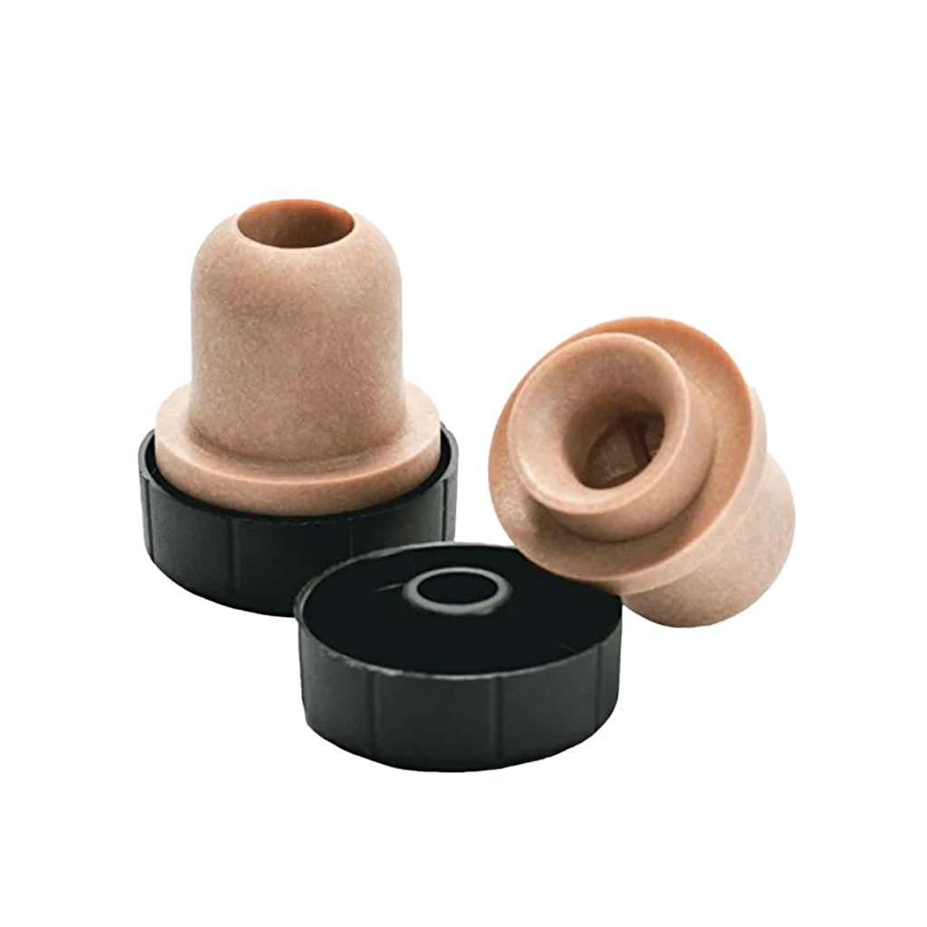 Two cork pour spouts with black rings and a black cap on a white background